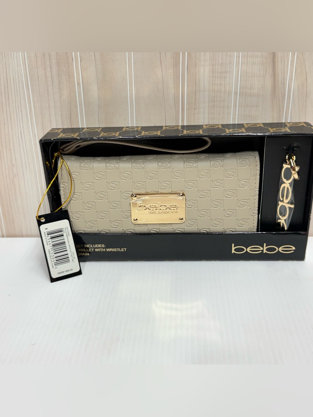 bebe Neutral Beige Logo-Embossed Wristlet Clutch with Gold Accents